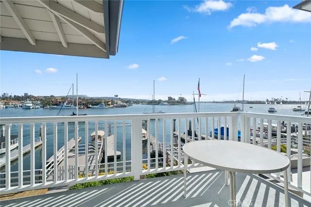 a bathroom with a shower sink and mirror
