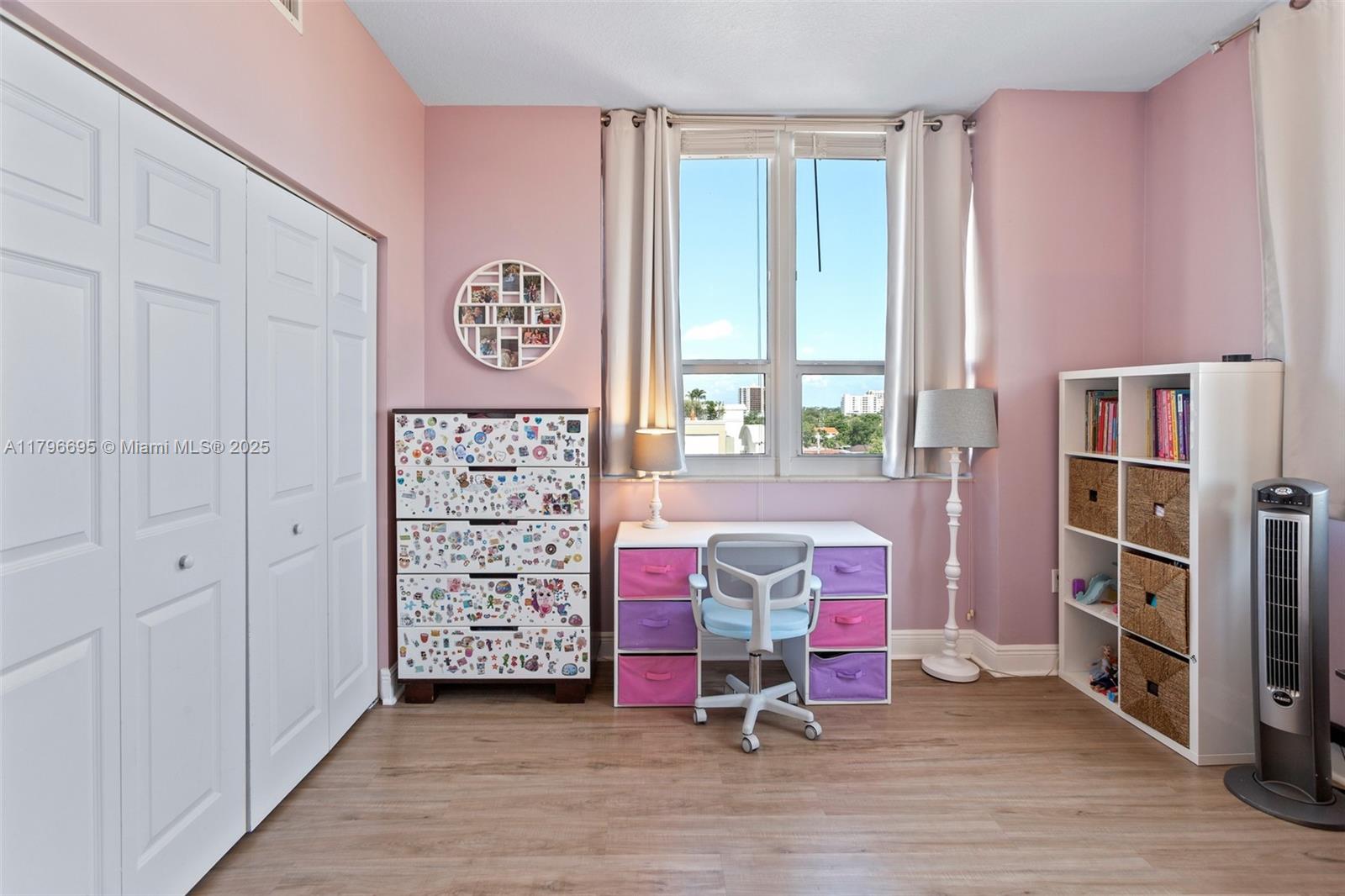 3232 Southwest 22nd Street, Unit 601 Miami, FL 33145 - Photo 18 of 38 a view of a bedroom with furniture and window