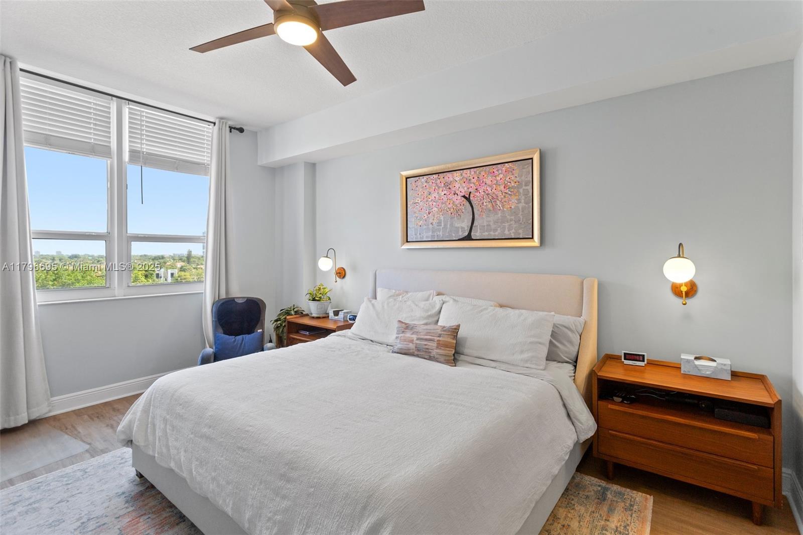 3232 Southwest 22nd Street, Unit 601 Miami, FL 33145 - Photo 21 of 38 a bedroom with bed and window