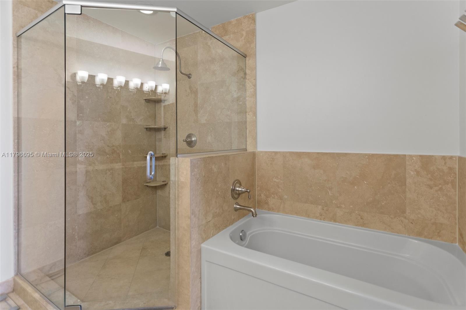3232 Southwest 22nd Street, Unit 601 Miami, FL 33145 - Photo 25 of 38 a bathroom with a shower and a bathtub