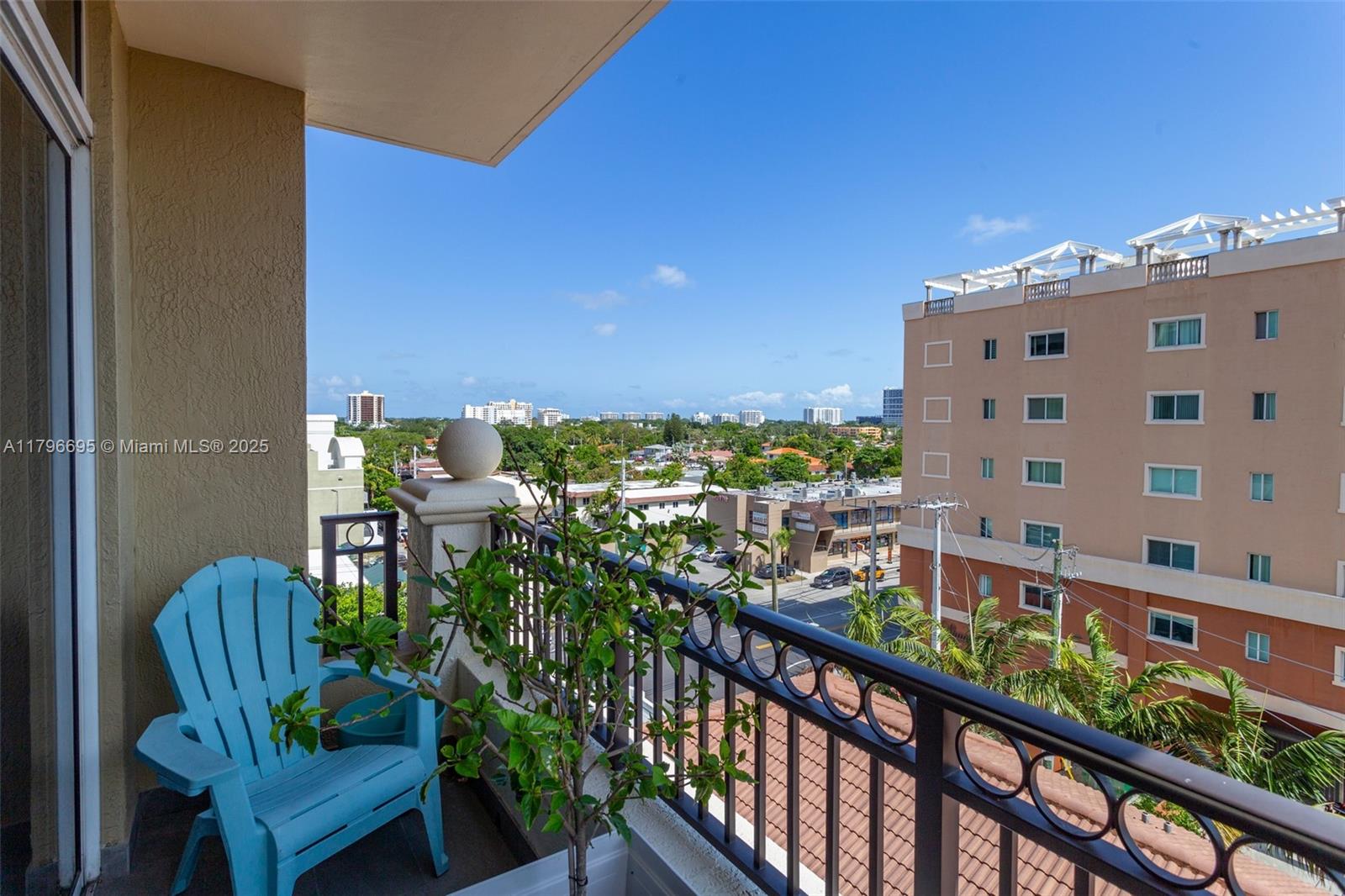 3232 Southwest 22nd Street, Unit 601 Miami, FL 33145 - Photo 28 of 38 a view of a balcony with chairs