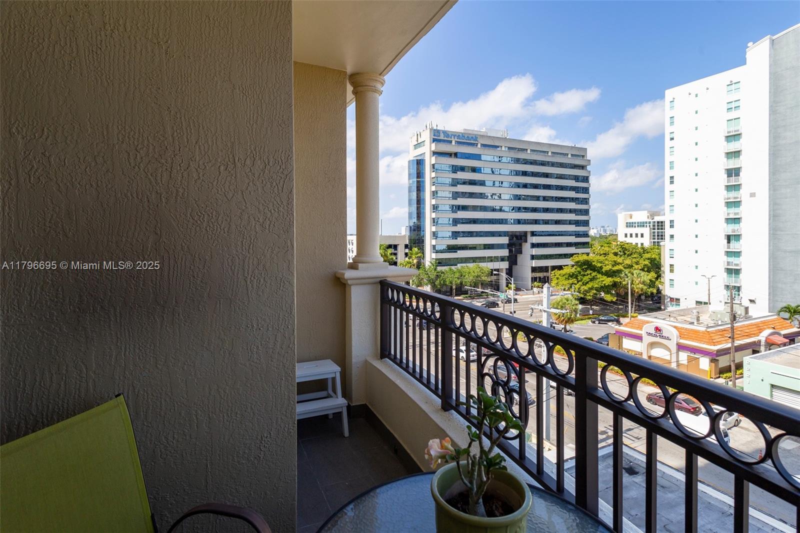 3232 Southwest 22nd Street, Unit 601 Miami, FL 33145 - Photo 29 of 38 a view of balcony with couch