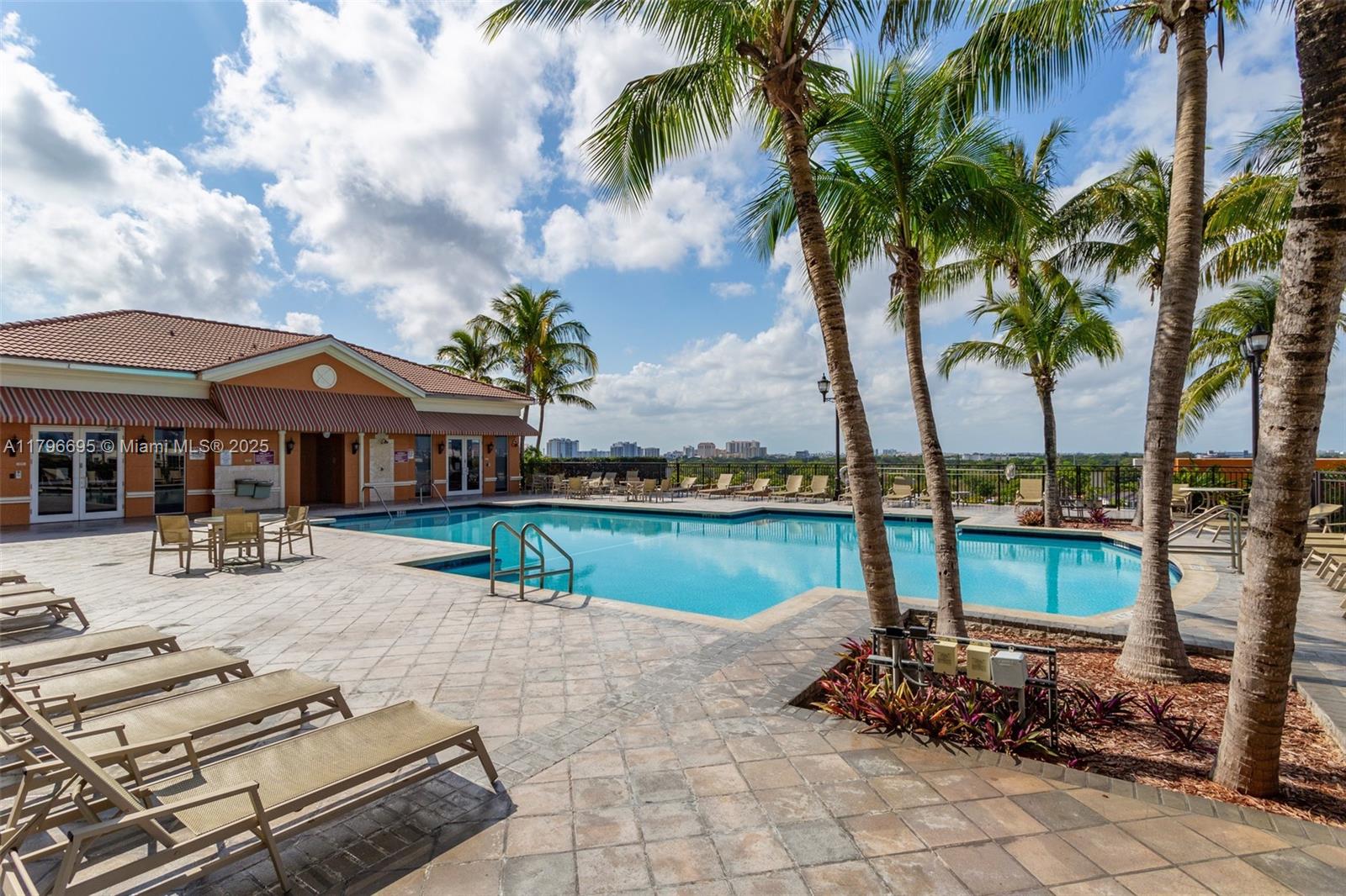 3232 Southwest 22nd Street, Unit 601 Miami, FL 33145 - Photo 30 of 38 a front view of a house with garden