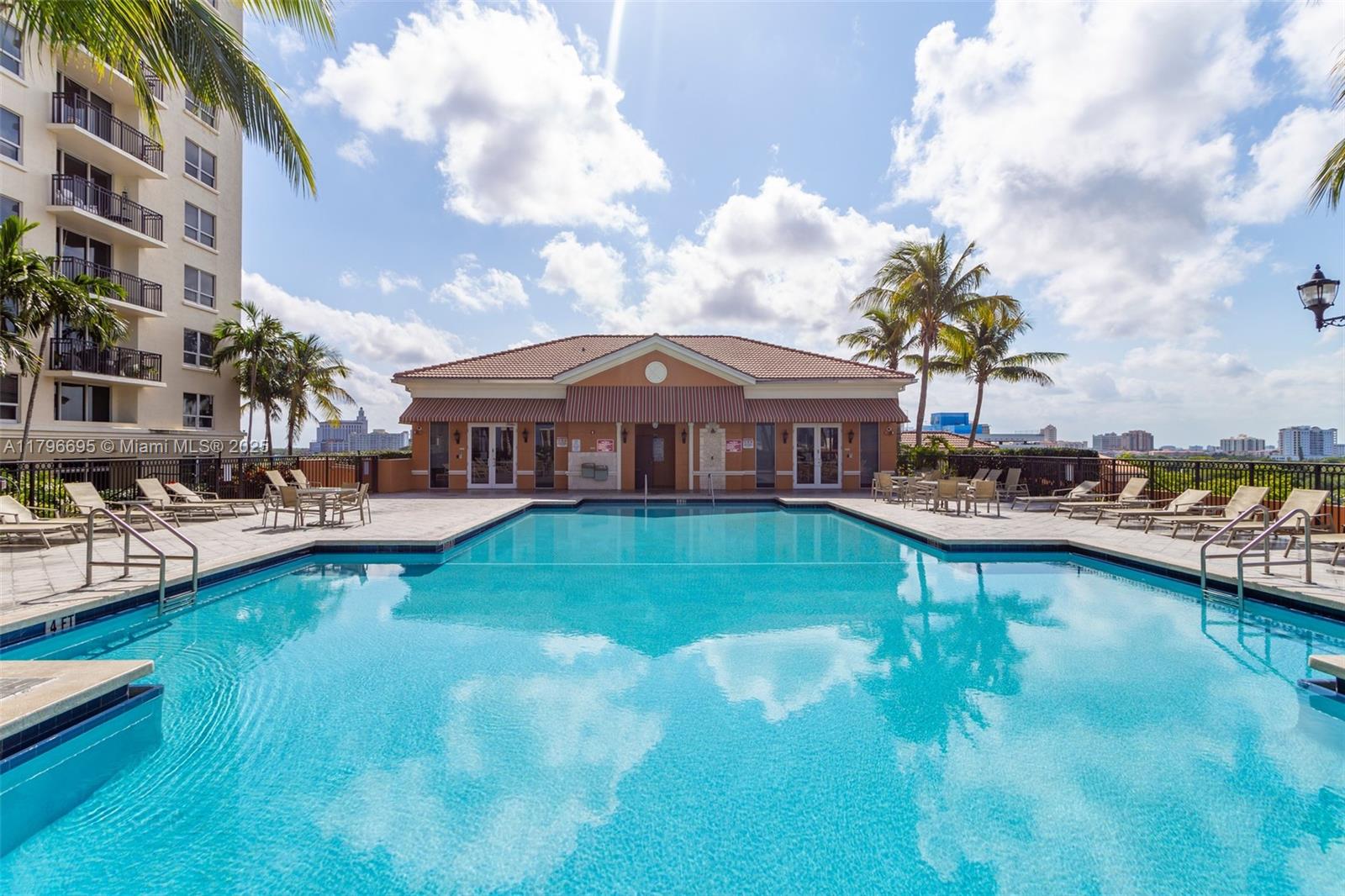 3232 Southwest 22nd Street, Unit 601 Miami, FL 33145 - Photo 36 of 38 a view of a house with swimming pool and sitting area
