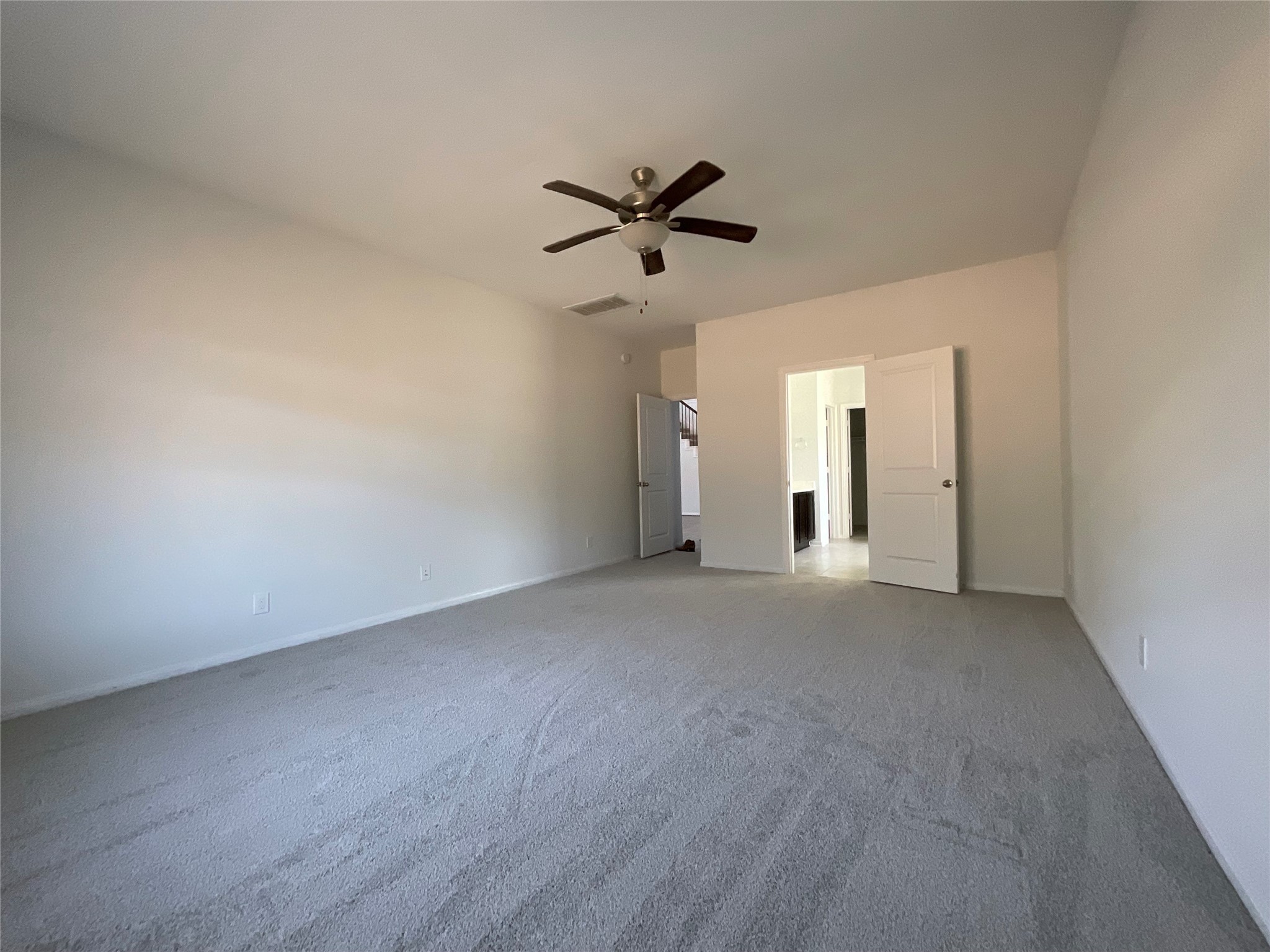 8039 Brooks Crossing Drive Baytown, TX 77521 - Photo 3 of 24 a view of a livingroom with a ceiling fan and window