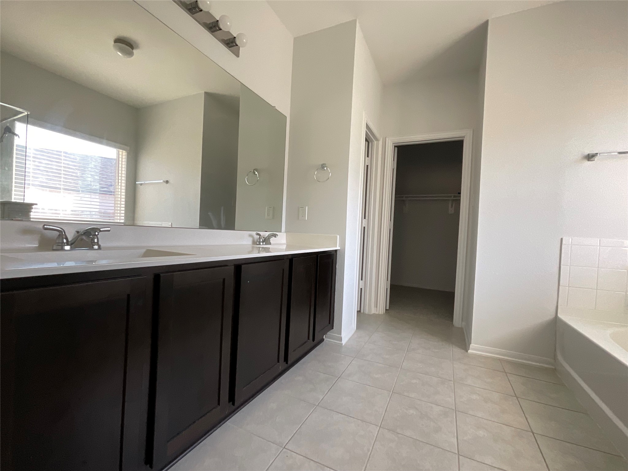 8039 Brooks Crossing Drive Baytown, TX 77521 - Photo 5 of 24 a bathroom with a sink and a mirror
