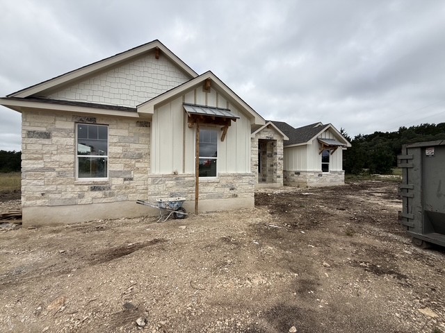 127 Riparian Elms Road Bertram, TX 78605 - Photo 22 of 22 Newly constructed home with a pleasing stone and siding facade offers excellent curb appeal.