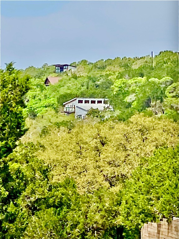 a view of a lake with a building in the background