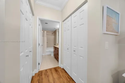 a view of a bathroom from a hallway