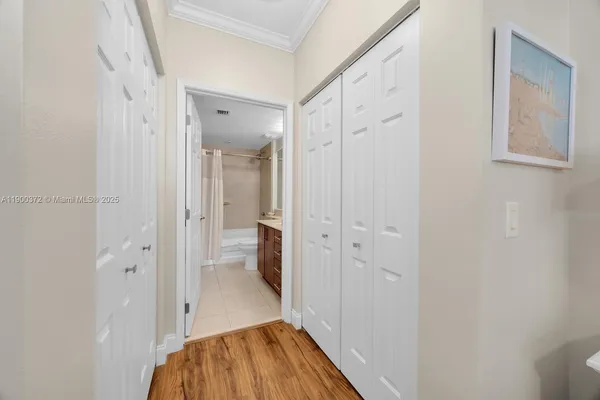 a view of a bathroom from a hallway