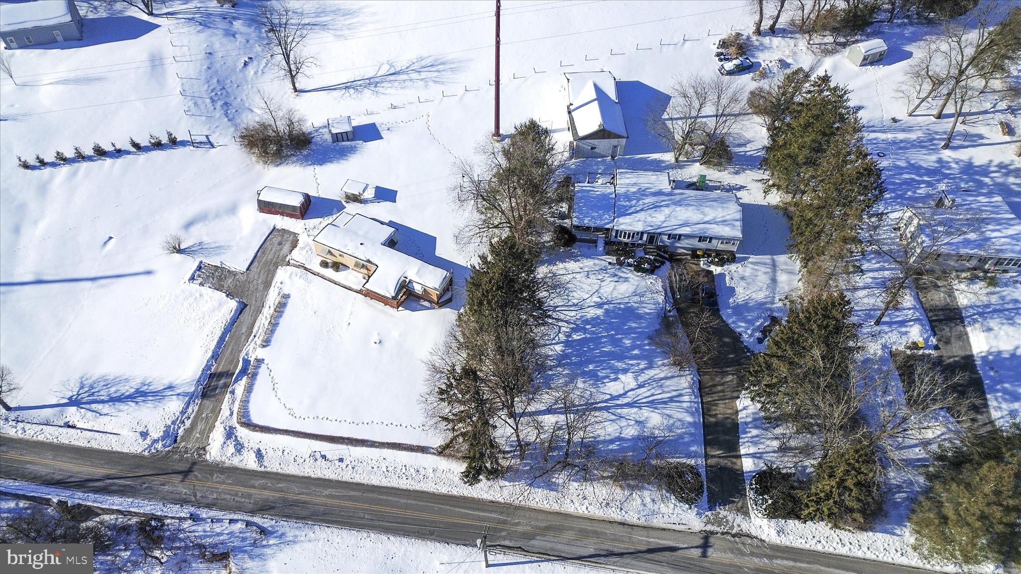 828 Spring City Road Phoenixville, PA 19460 - Photo 13 of 17 an aerial view of residential houses with outdoor space