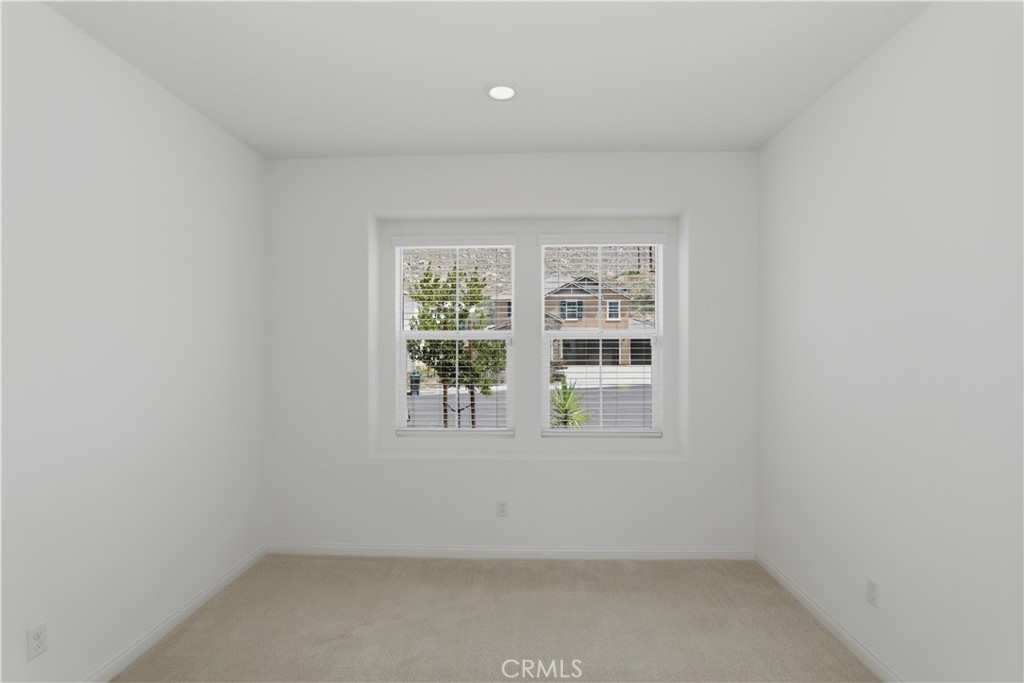 21159 Blue Jeans Court Riverside, CA 92507 - Photo 43 of 63 an empty room with a window