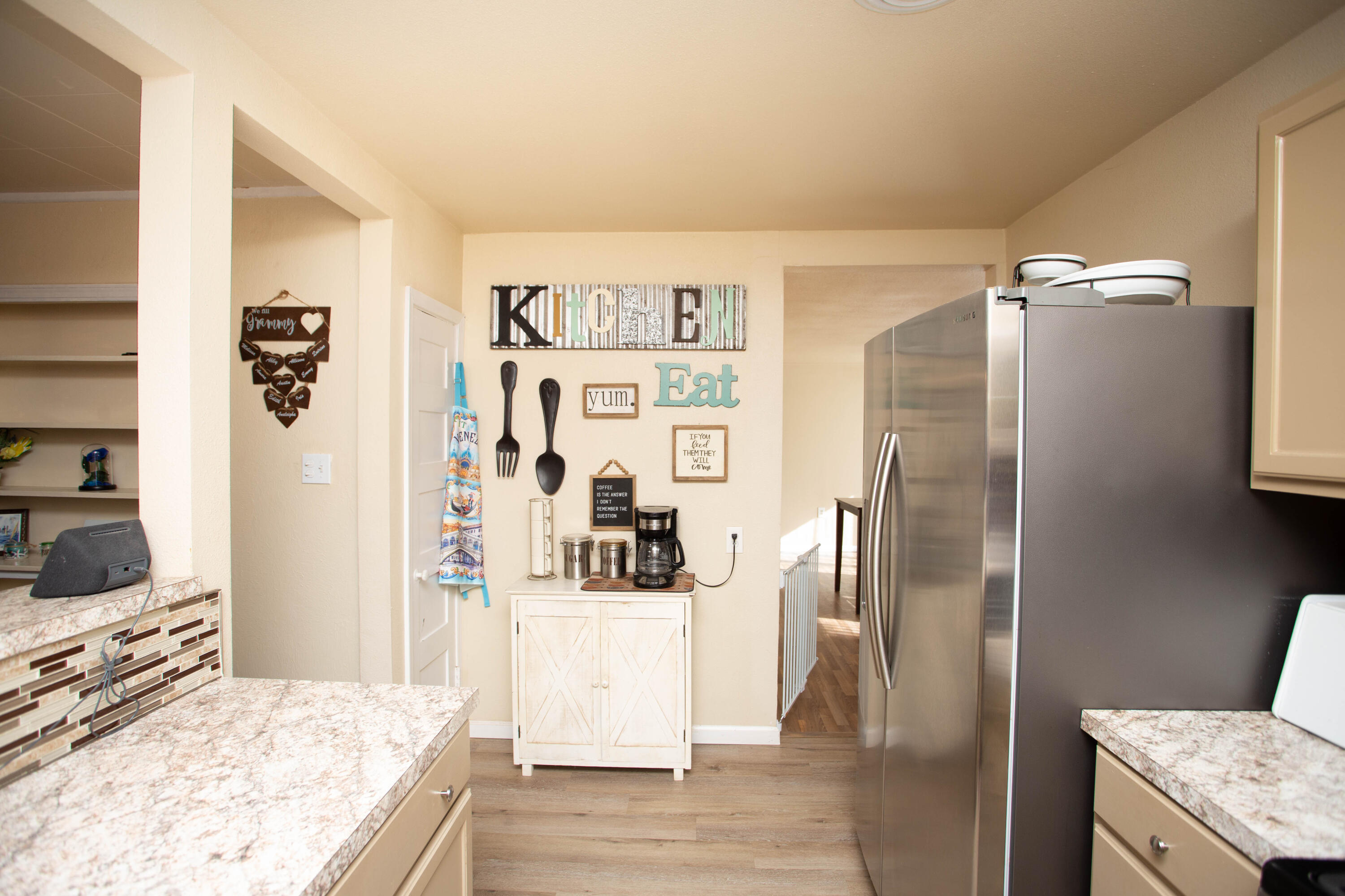 2103 30th Street Lubbock, TX 79411 - Photo 11 of 15 a kitchen with stainless steel appliances granite countertop a refrigerator and a stove