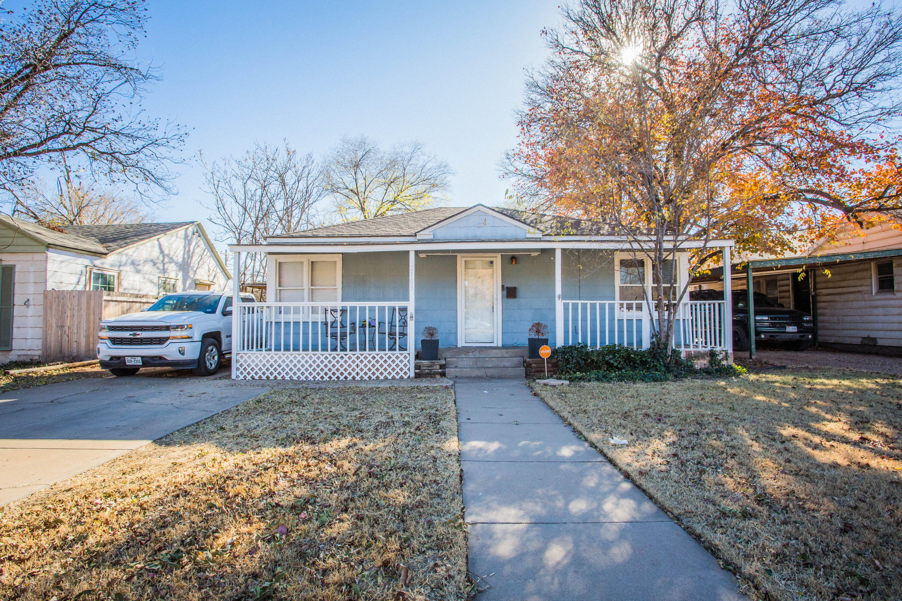 2103 30th Street Lubbock, TX 79411 - Photo 2 of 15 a view of a house with a yard in front of it