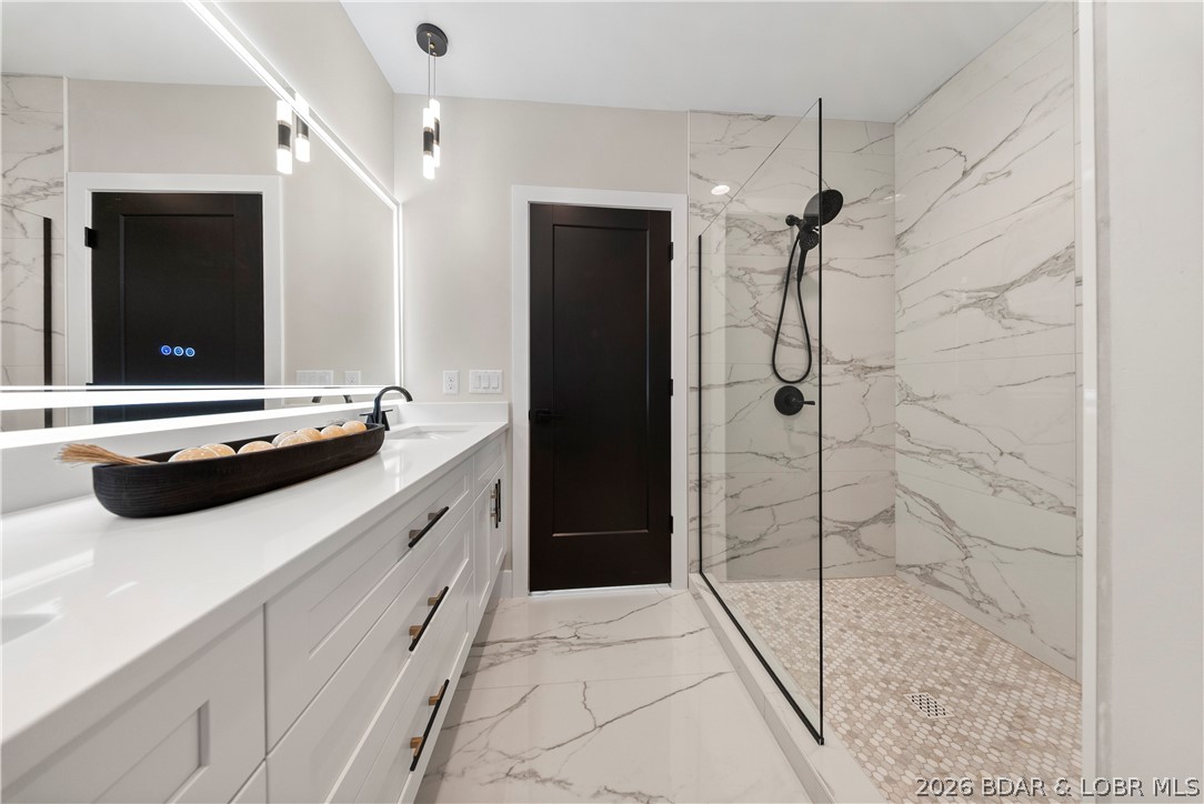 439 Red Bud Road Lake Ozark, MO 65049 - Photo 47 of 98 Oversized walk-in shower with floor-to-ceiling til