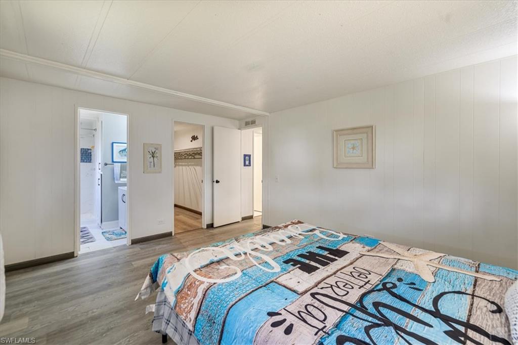 952 Days Lane North Fort Myers, FL 33917 - Photo 14 of 46 a bedroom with a bed and a window