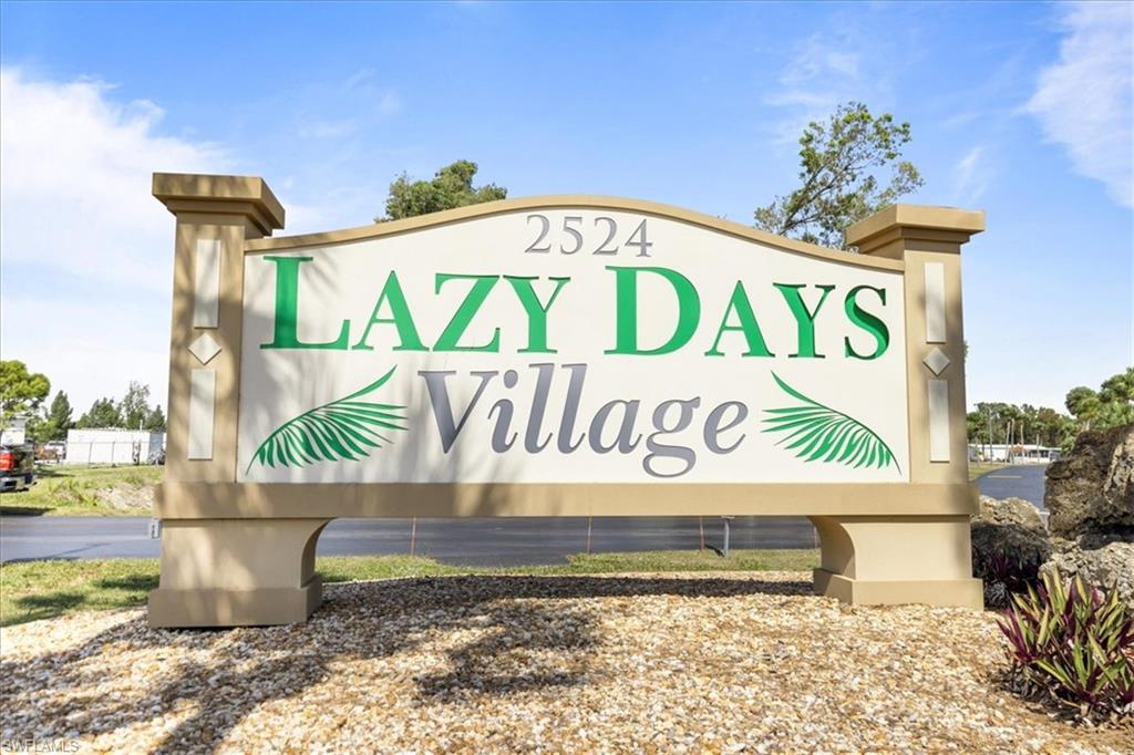952 Days Lane North Fort Myers, FL 33917 - Photo 26 of 46 a street sign that is on a pole