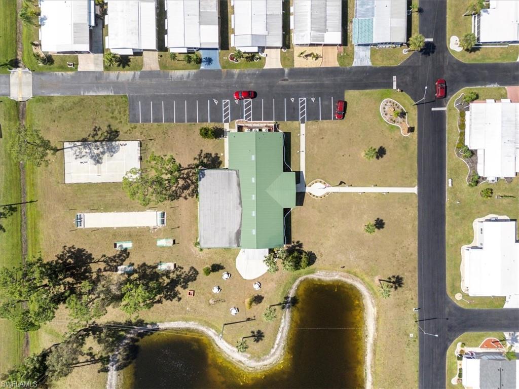 952 Days Lane North Fort Myers, FL 33917 - Photo 32 of 46 a front view of a house with outdoor seating