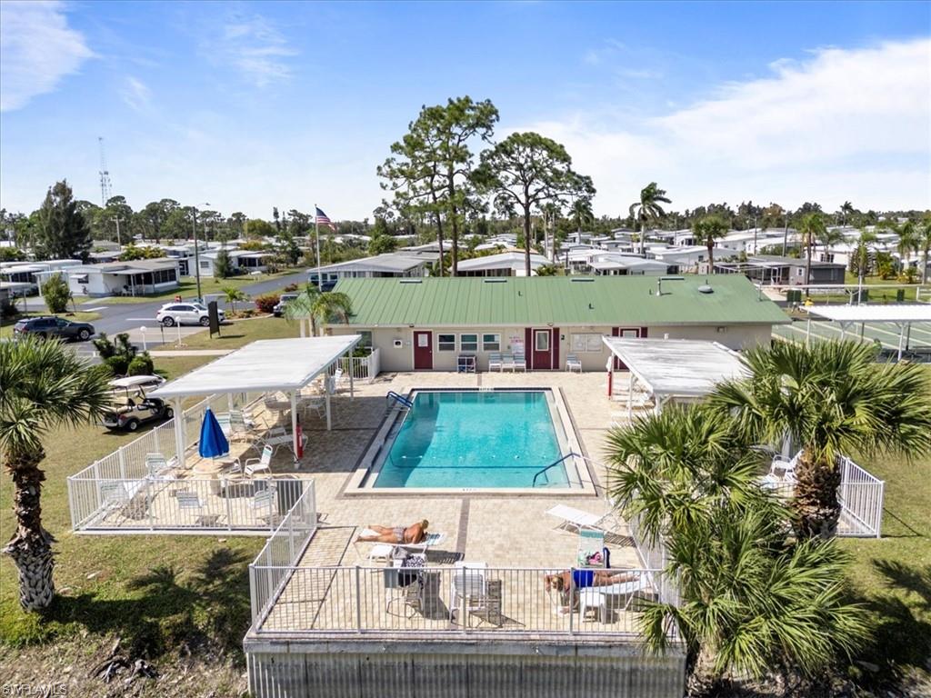 952 Days Lane North Fort Myers, FL 33917 - Photo 34 of 46 a terrace with outdoor seating and city view