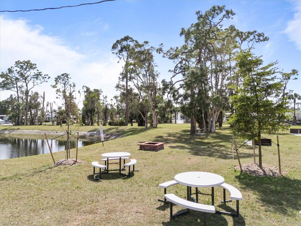952 Days Lane North Fort Myers, FL 33917 - Photo 41 of 46 a swimming pool with outdoor seating and yard