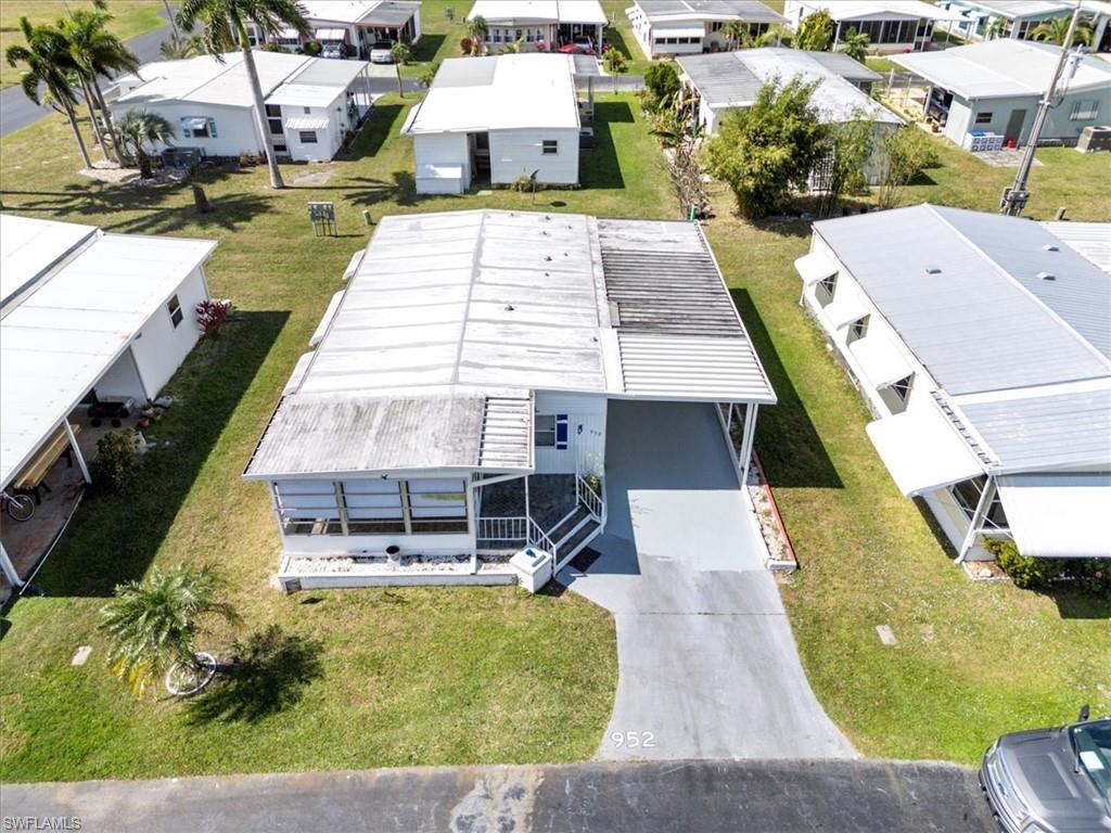952 Days Lane North Fort Myers, FL 33917 - Photo 42 of 46 an aerial view of a house with swimming pool