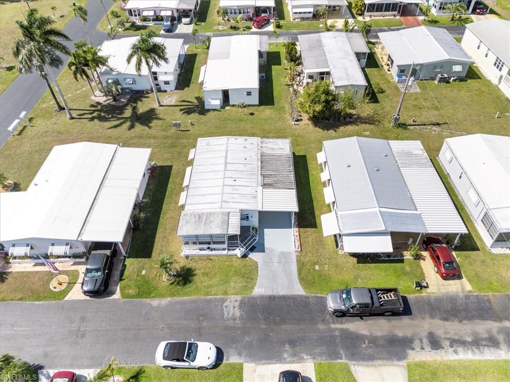952 Days Lane North Fort Myers, FL 33917 - Photo 43 of 46 an aerial view of a house with a garden