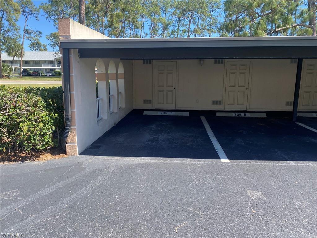 705 Augusta Boulevard, Unit 7055 Naples, FL 34113 - Photo 15 of 18 a view of backyard