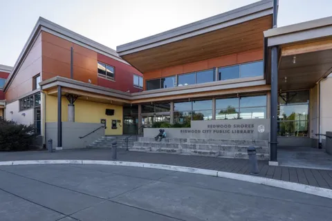 a view of a building with a patio