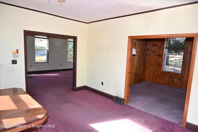a view of livingroom with front door