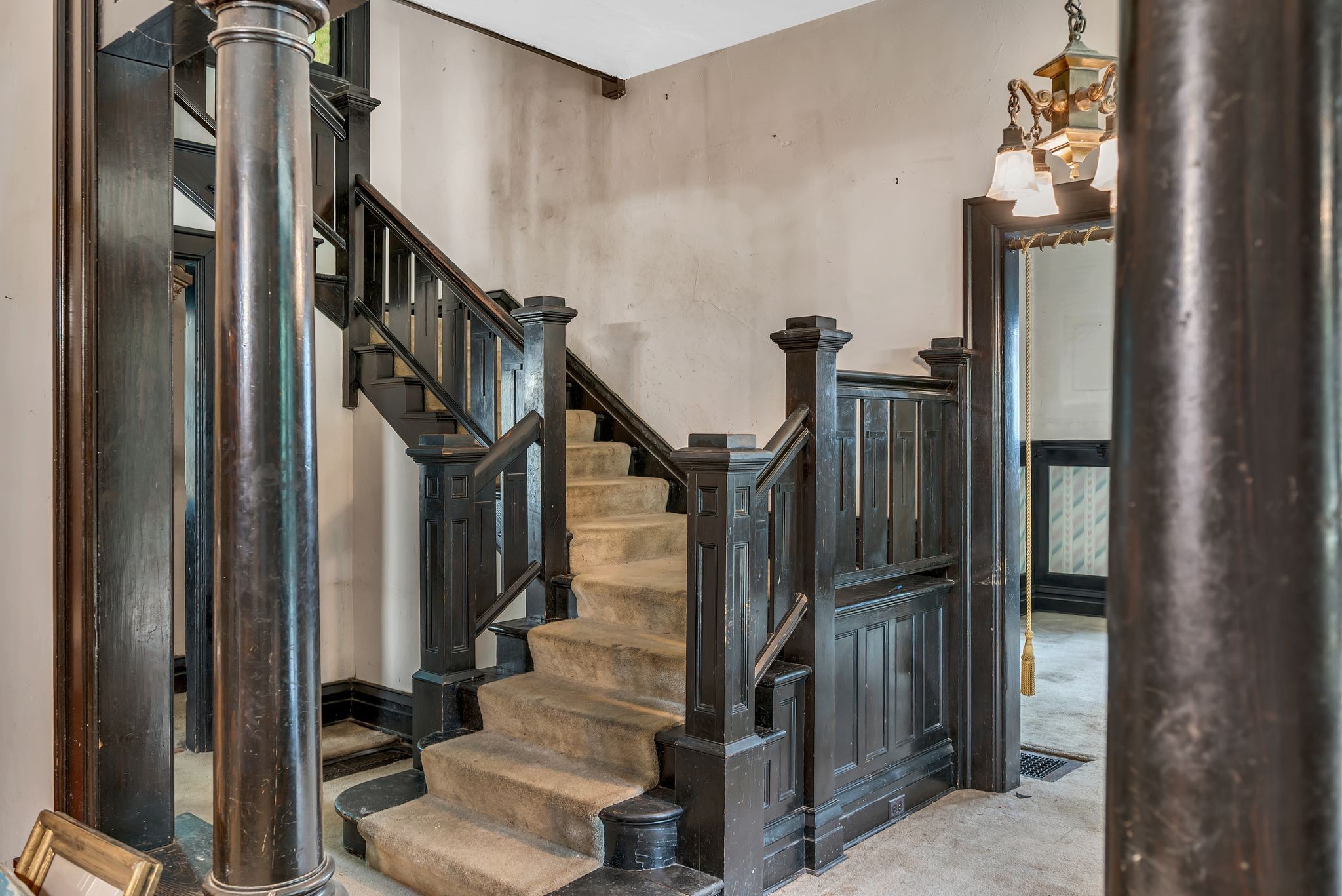 3818 Richland Avenue Nashville, TN 37205 - Photo 10 of 13 a view of staircase with lots of frames on wall and stairs