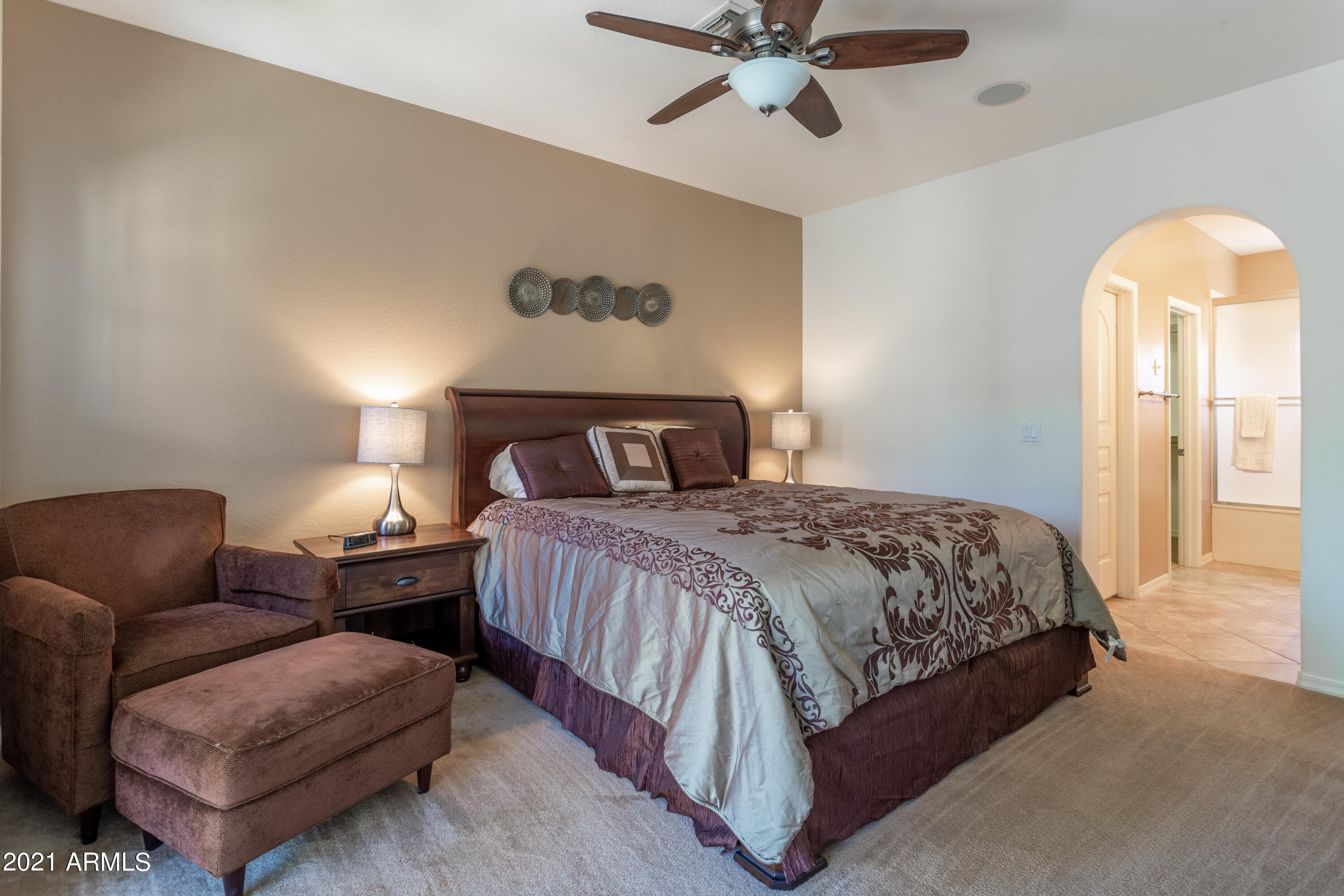 3935 East Rough Rider Road, Unit 1192 Phoenix, AZ 85050 - Photo 9 of 20 a bedroom with bed and window