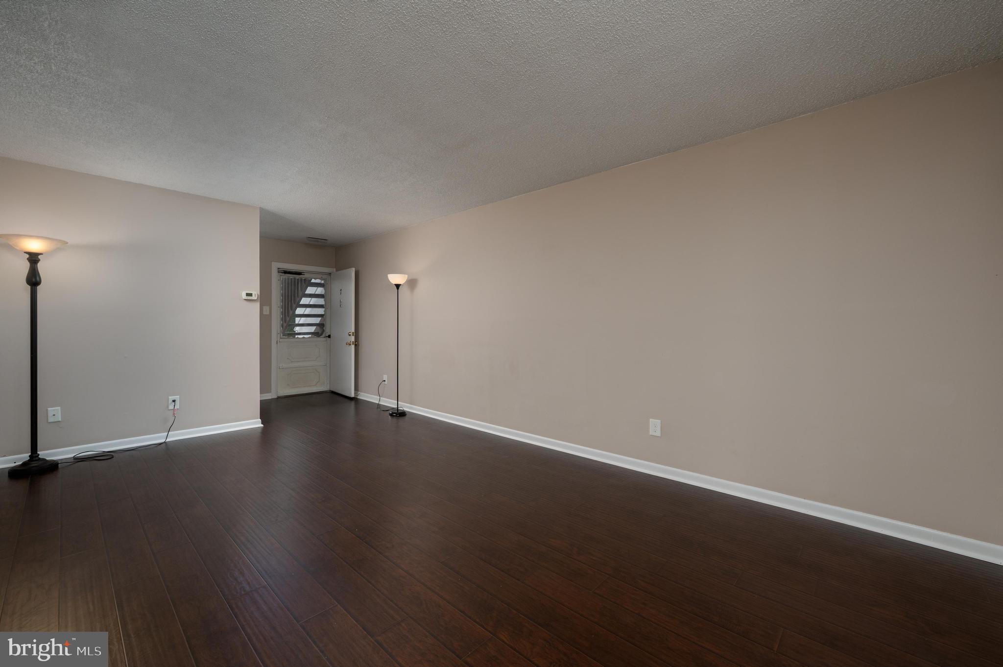 411 Stiles Avenue, Unit A7 Maple Shade, NJ 08052 - Photo 9 of 20 Beautiful Plank Flooring and Neutral Walls