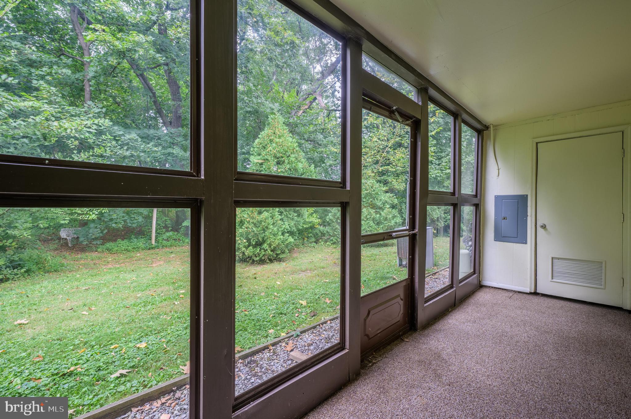 411 Stiles Avenue, Unit A7 Maple Shade, NJ 08052 - Photo 4 of 20 View of Woods from Sunroom