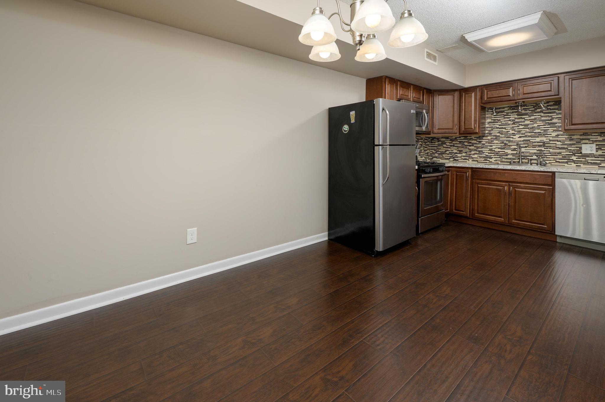 411 Stiles Avenue, Unit A7 Maple Shade, NJ 08052 - Photo 6 of 20 Dining Area open to Updated Kitchen