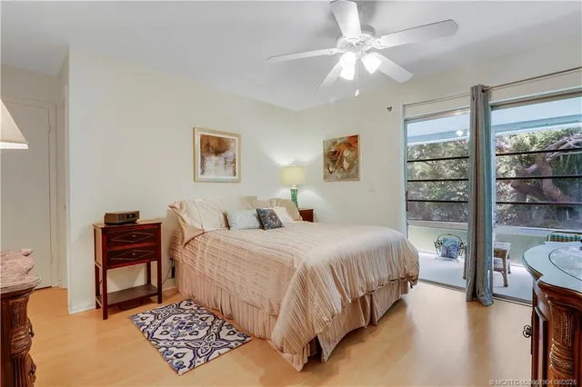 a bedroom with a bed and a cabinets