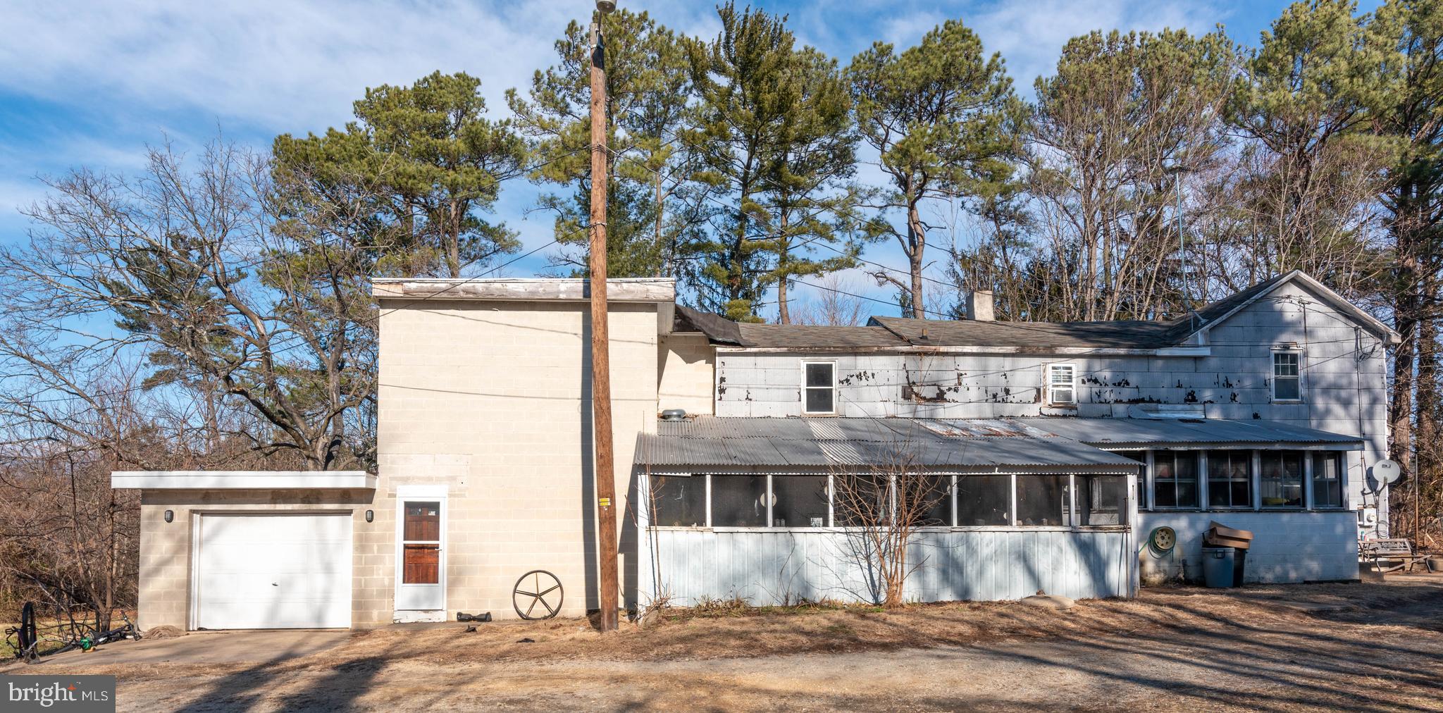 2100 Singerly Road Elkton, MD 21921 - Photo 1 of 67 a front view of a house with a garden