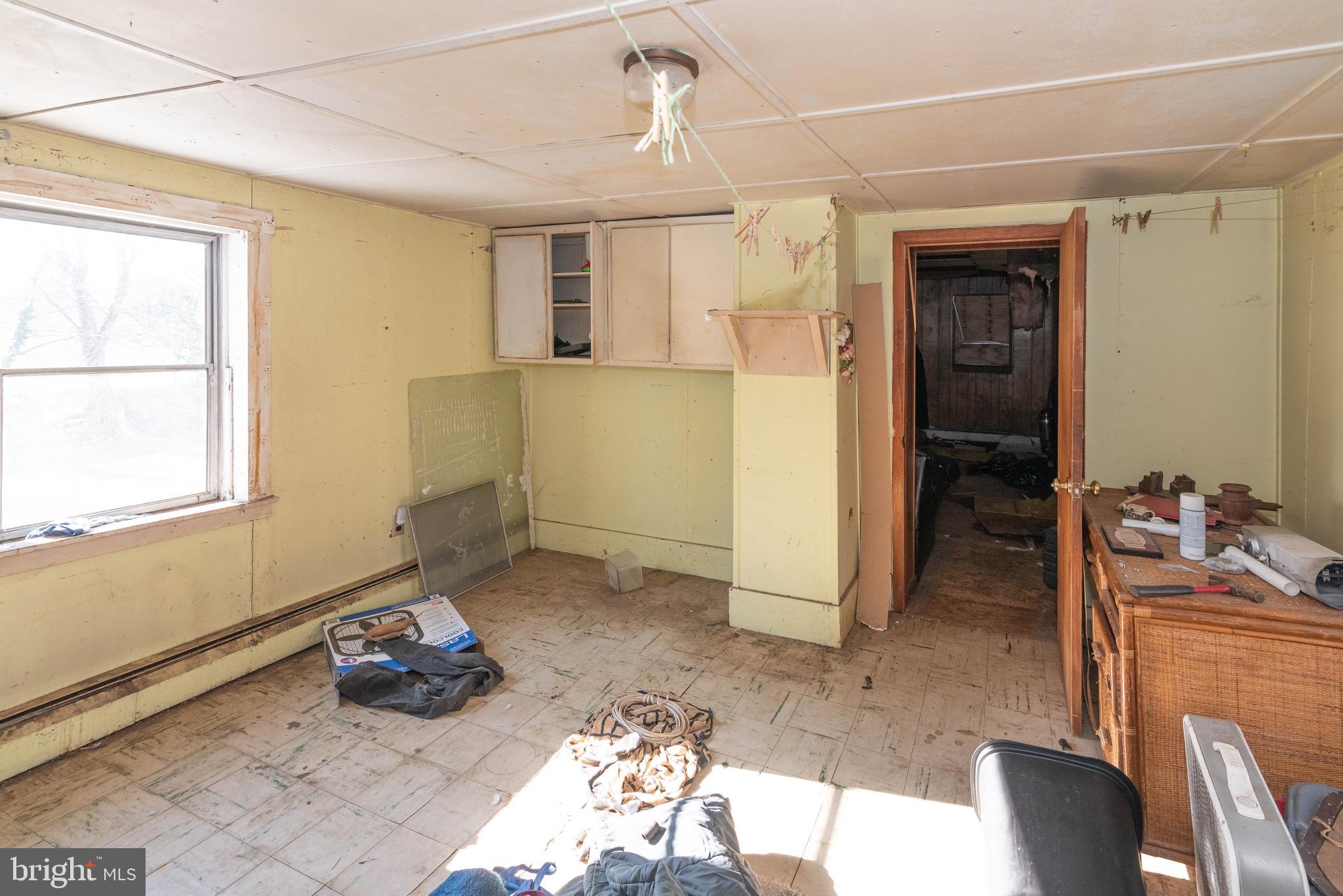 2100 Singerly Road Elkton, MD 21921 - Photo 23 of 67 a view of a livingroom with wooden floor and a window
