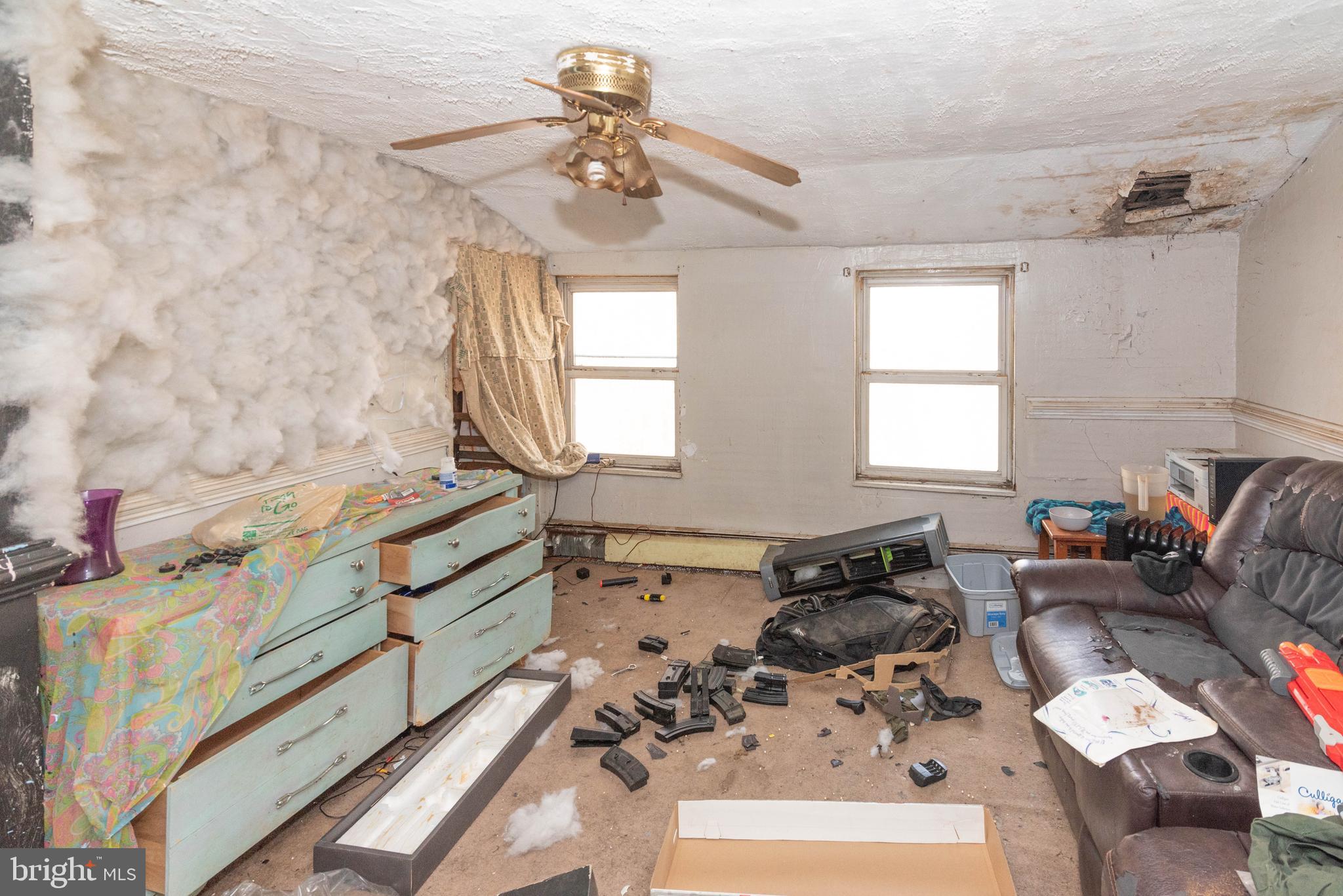 2100 Singerly Road Elkton, MD 21921 - Photo 33 of 67 a living room with furniture chess board and a window