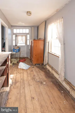 a view of a livingroom with furniture and window