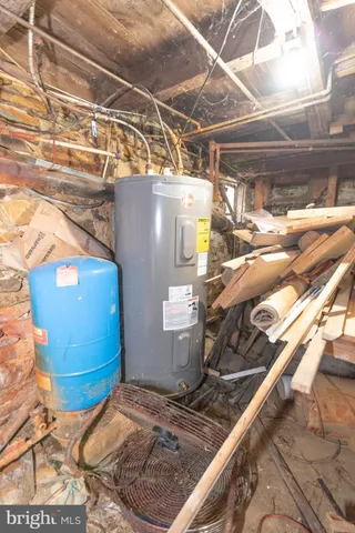 a view of yard covered with snow in front of house