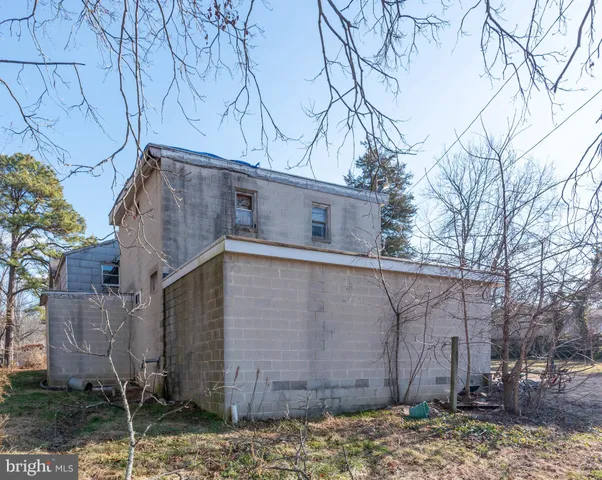 a house with trees in front of it