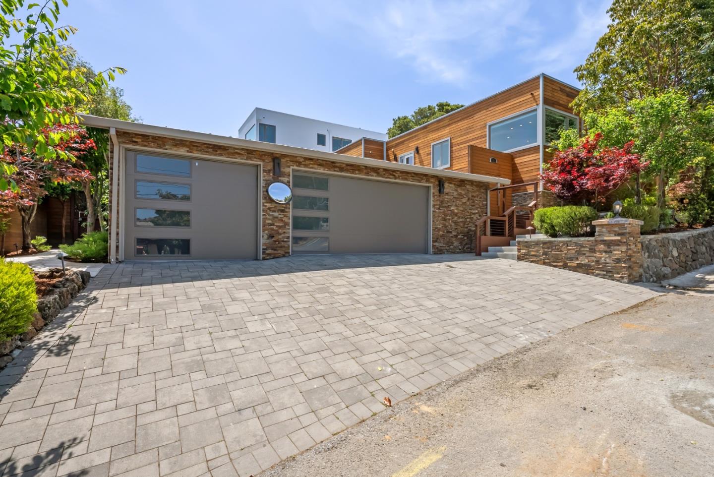 1 Millbrae Circle Millbrae, CA 94030 - Photo 106 of 110 a front view of a house with a yard and garage