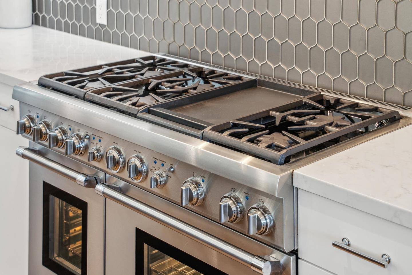 1 Millbrae Circle Millbrae, CA 94030 - Photo 17 of 110 a close view of a stove top oven