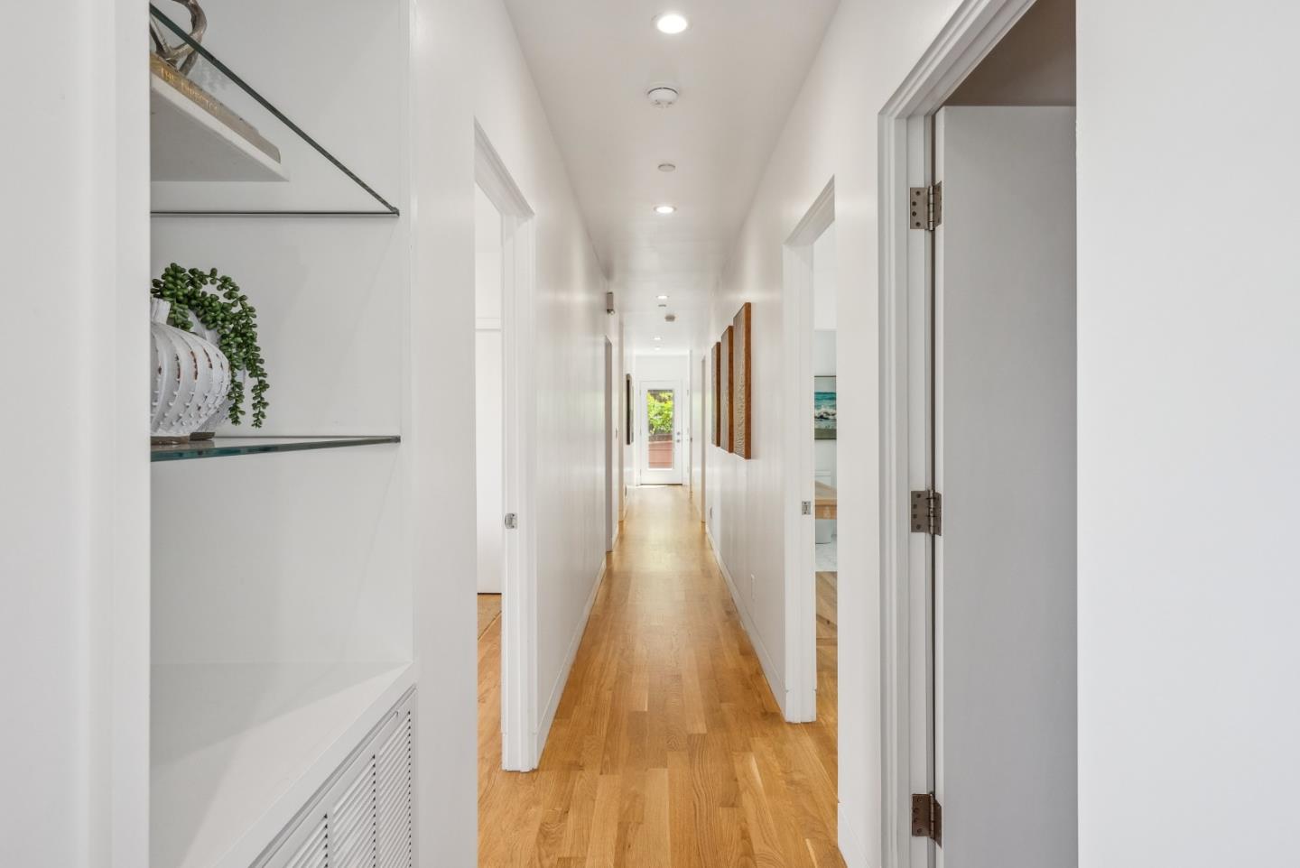 1 Millbrae Circle Millbrae, CA 94030 - Photo 38 of 110 a view of a hallway with wooden floor and staircase