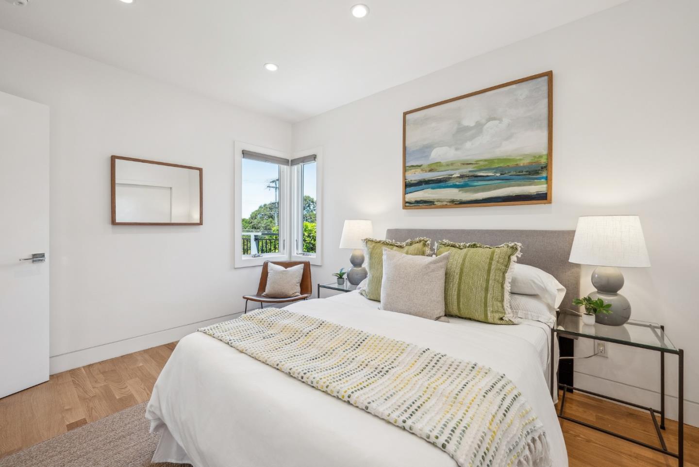 1 Millbrae Circle Millbrae, CA 94030 - Photo 40 of 110 a bedroom with a bed and a painting on the wall