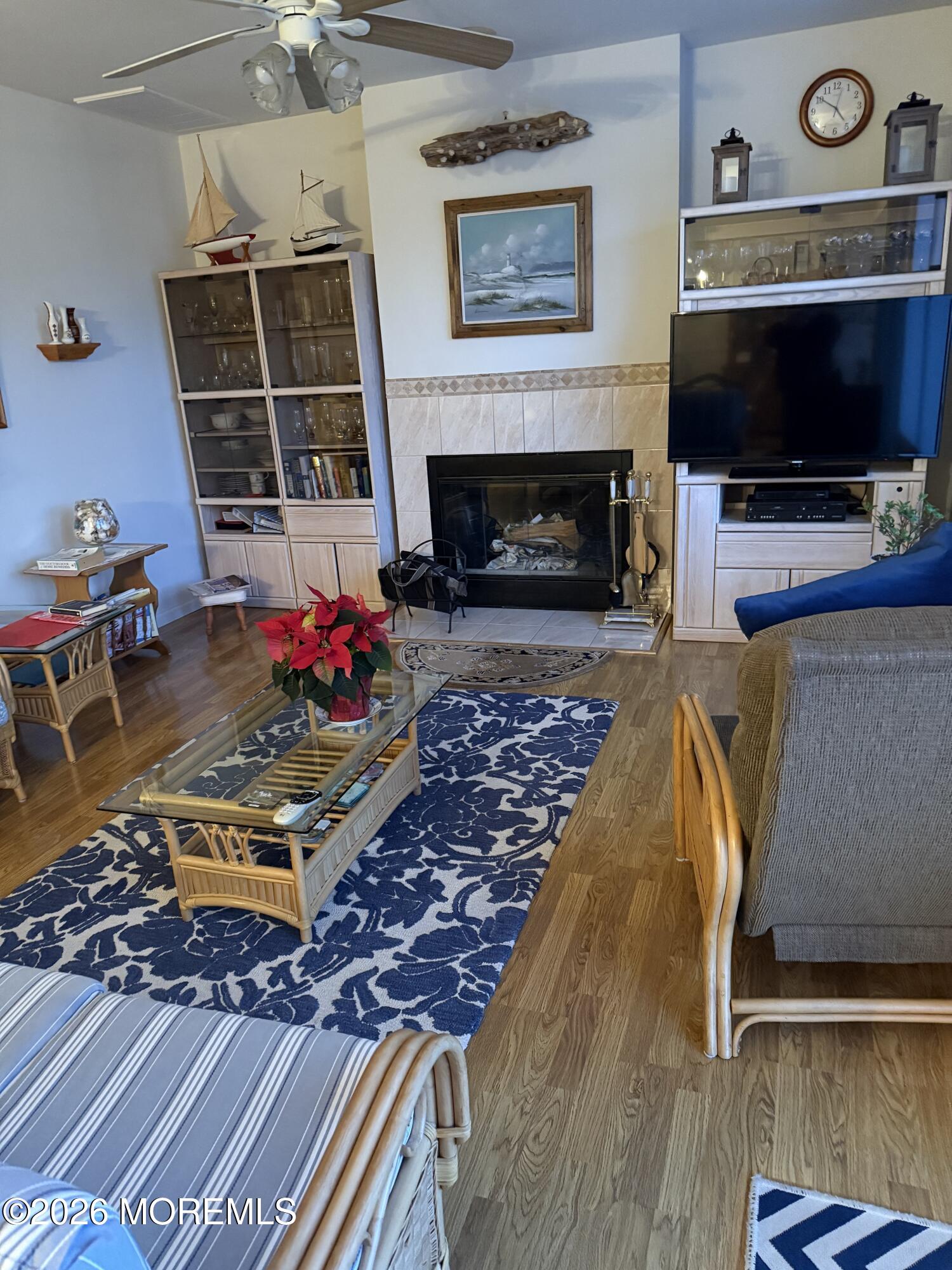 7 Albatross Point Bayville, NJ 08721 - Photo 13 of 56 a living room with furniture flat screen tv and a fireplace