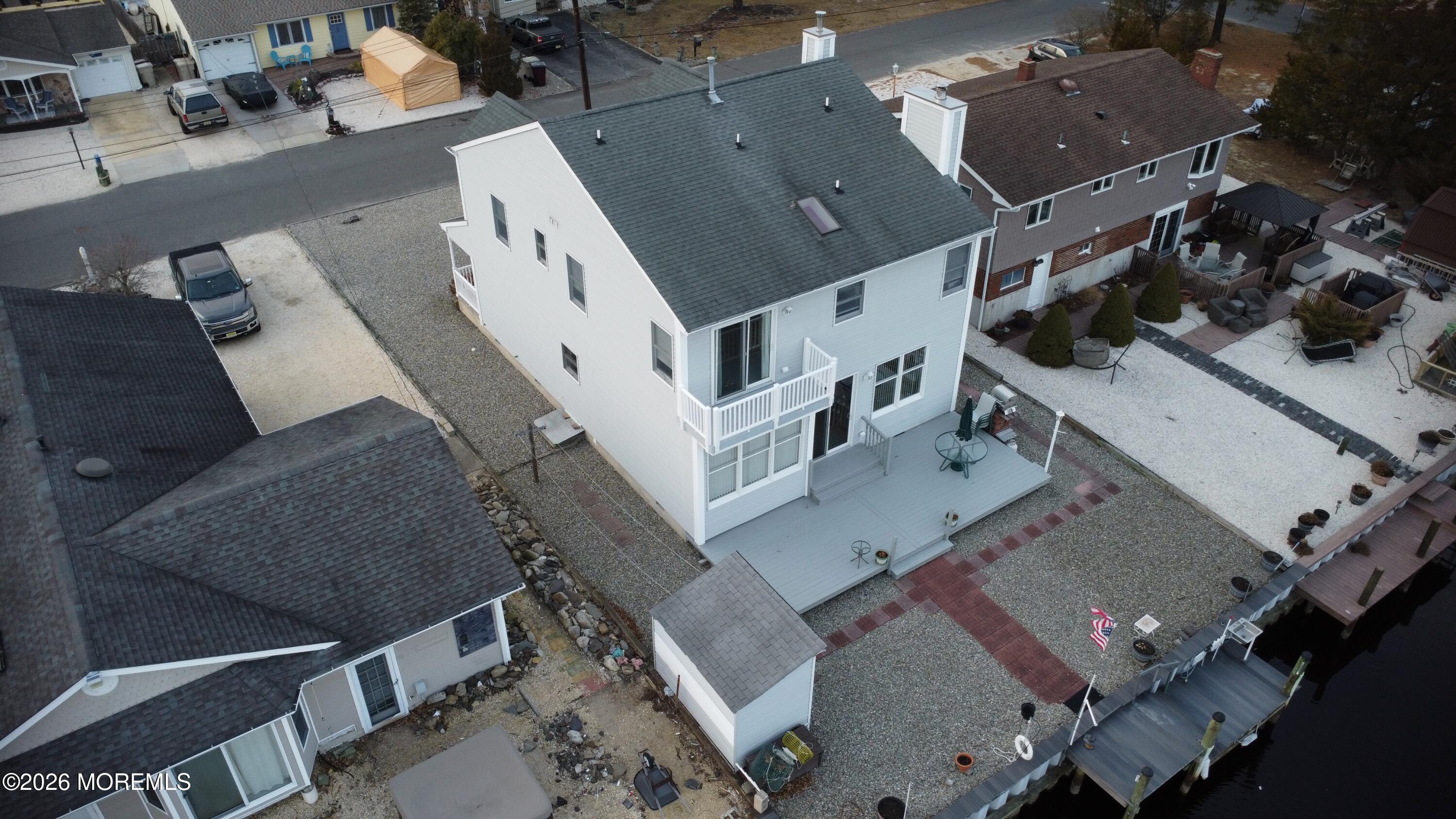 7 Albatross Point Bayville, NJ 08721 - Photo 21 of 56 an aerial view of a house with a yard
