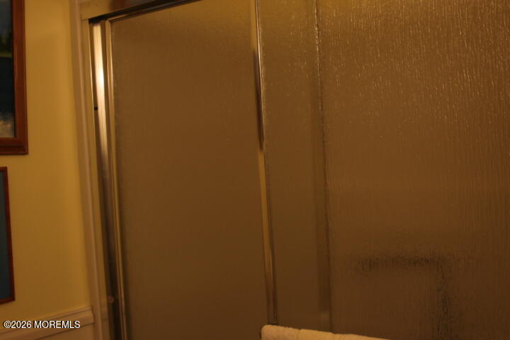 7 Albatross Point Bayville, NJ 08721 - Photo 38 of 56 a bathroom with a shower