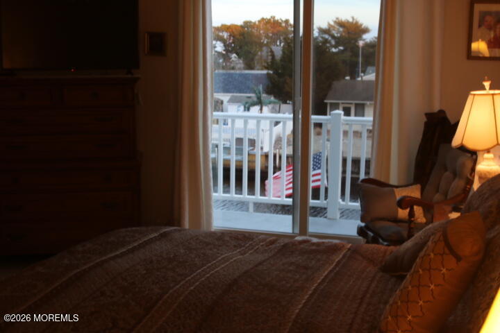 7 Albatross Point Bayville, NJ 08721 - Photo 47 of 56 a bedroom with a bed and a window