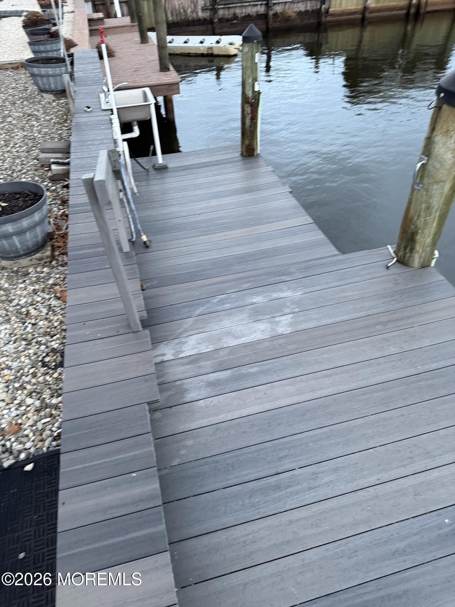 7 Albatross Point Bayville, NJ 08721 - Photo 5 of 56 a view of a balcony with wooden floor